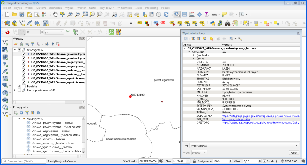 Grafika przedstawiająca identyfikację obiektu w QGIS